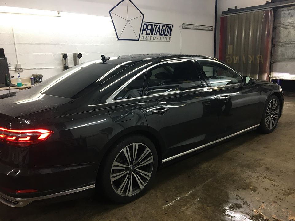 Black car inside the shop garage Glasgow
