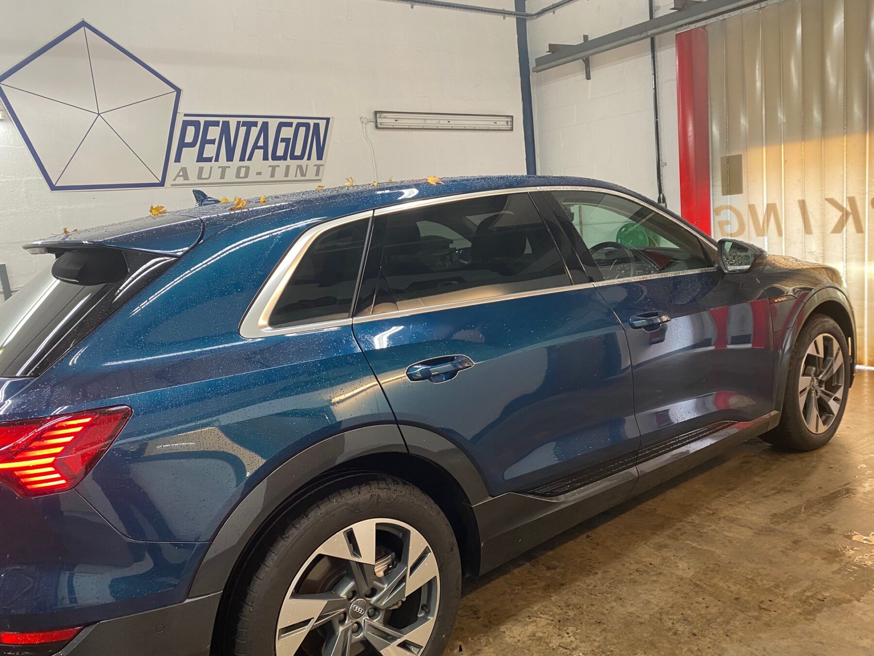 Audi in garage showcasing new tinted windows in Glasgow